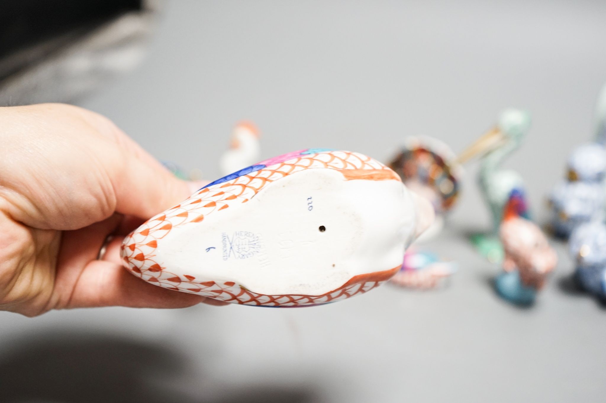 11 Herend porcelain animals and a similar egg shaped box